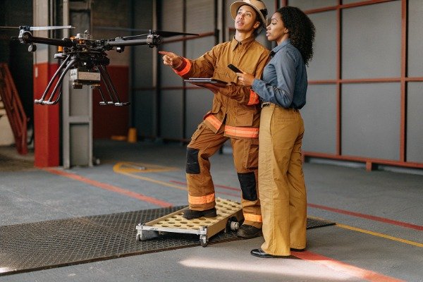 Professional procurement manager inspecting drone payload (ID#1)