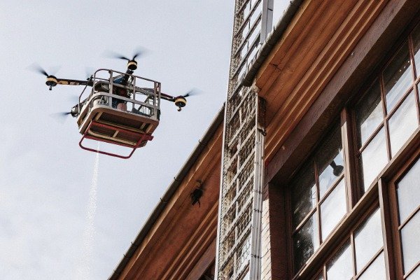 Heavy-lift drone carrying firefighting payload (ID#3)