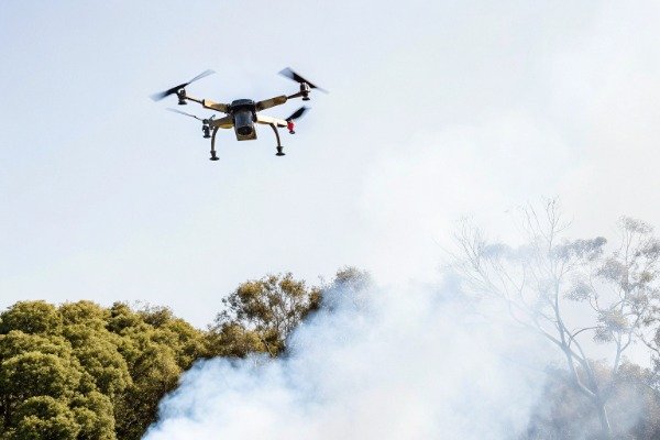 Drone navigating through dense smoke outdoors (ID#5)