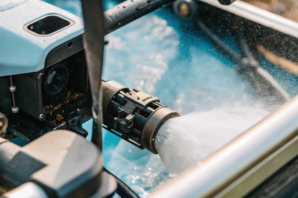 Drone spraying water for firefighting in detail (ID#5)