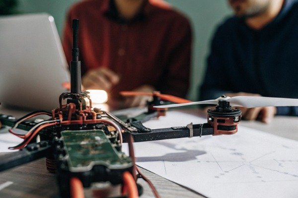 Close photorealistic drone internal components circuit board (ID#1)