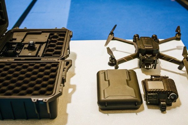 Drone gear display Drone and equipment case on table (ID#2)