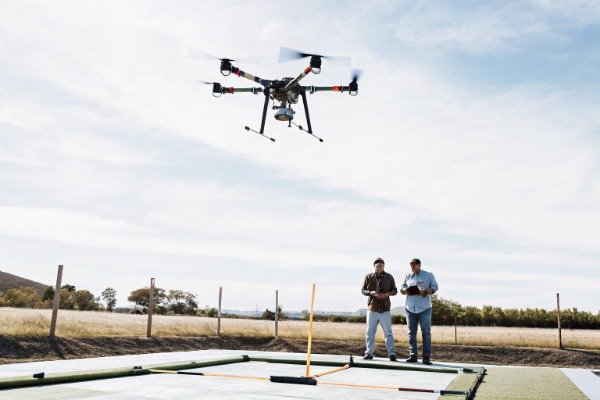 Drone flight test Drone flight test outdoors with two operators (ID#3)