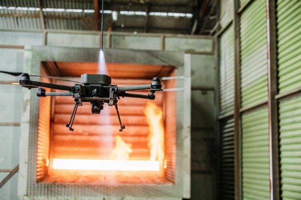Drone hovering in heat chamber during firefighting test (ID#5)