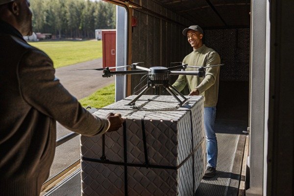 Secure drone delivery Industrial delivery with drone securely packaged (ID#4)