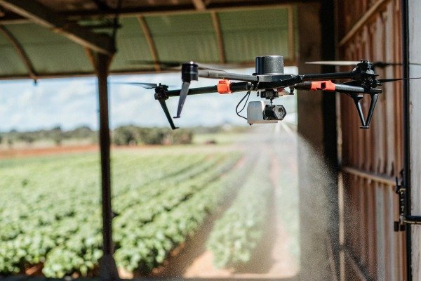 Agricultural drone flying over crops spraying (ID#3)