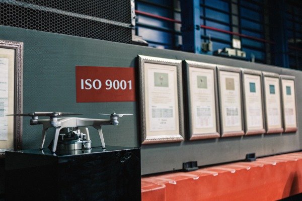 Drone displayed near ISO 9001 certificates (ID#5)