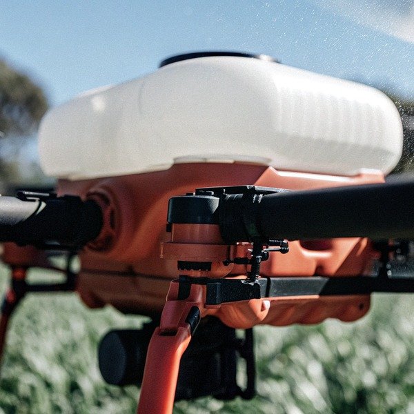 Close-up of drone component in field (ID#1)