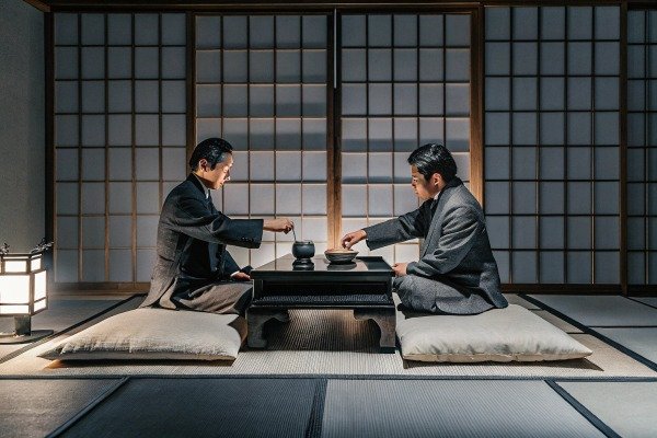 Two men having tea in traditional Japanese room (ID#2)