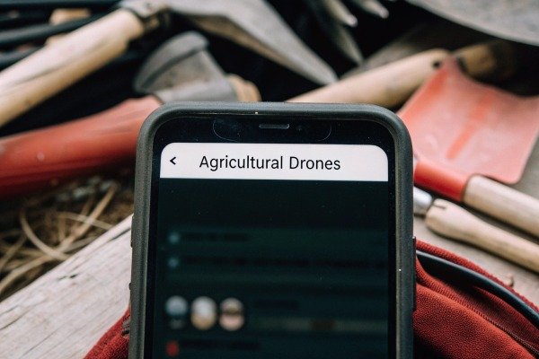 Smartphone showing agricultural drones app (ID#3)