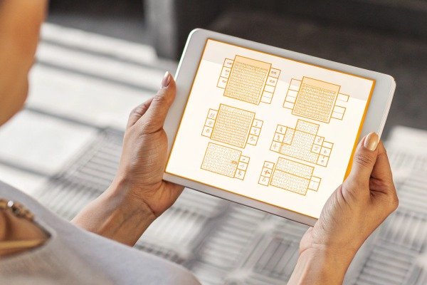 Circuit diagrams view Person holding tablet with circuit diagrams (ID#2)