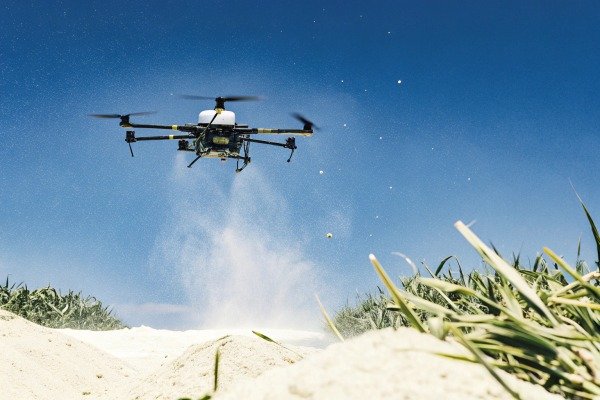 Agricultural drone flying over field with dust (ID#2)