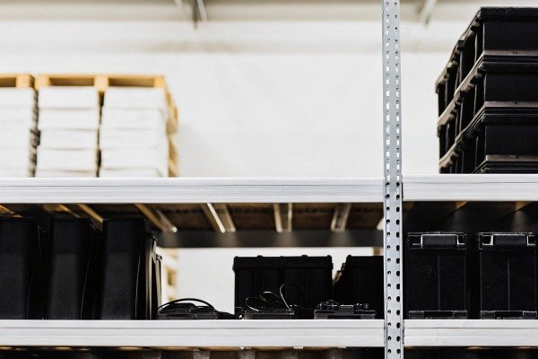 Warehouse shelves with black storage boxes (ID#2)