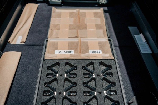 Organized drone parts in case labeled ISO and ROHS (ID#2)