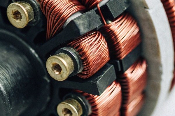 Macro view of copper wire windings inside a high-performance brushless drone motor (ID#4)