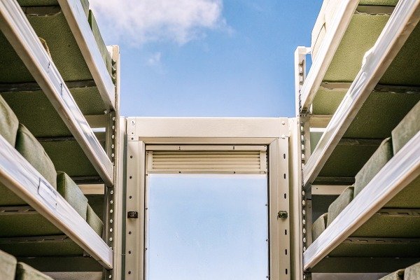 Experienced drone pilot operating a drone using a professional radio transmitter (ID#5)