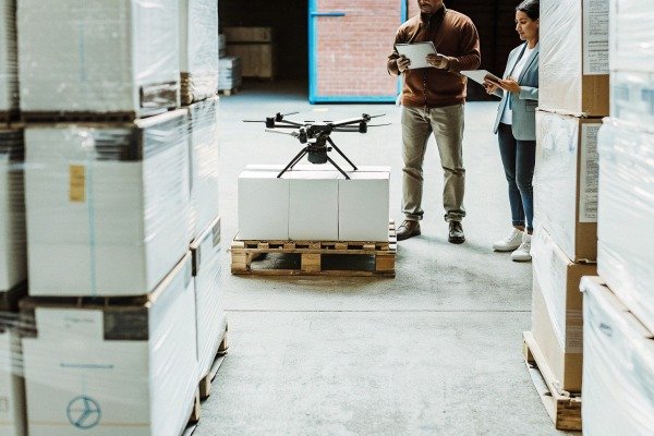 Compact foldable drone sitting on a landing pad ready for takeoff (ID#5)