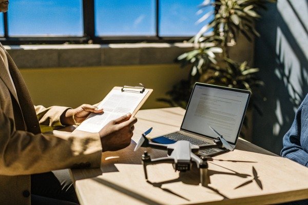 Aerial view captured by a drone showing a modern urban city skyline (ID#3)