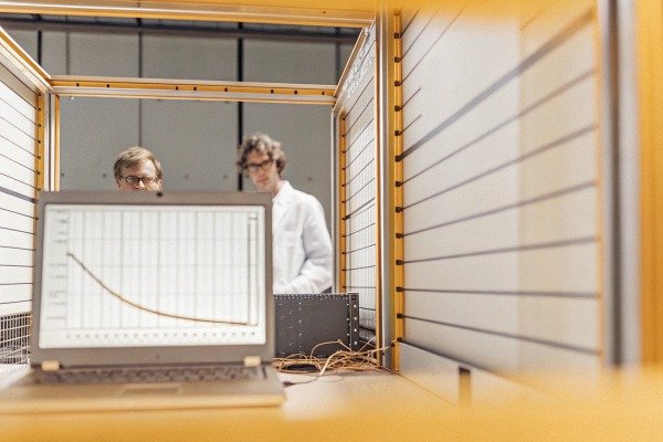 Compact foldable drone sitting on a wooden table ready for travel (ID#5)