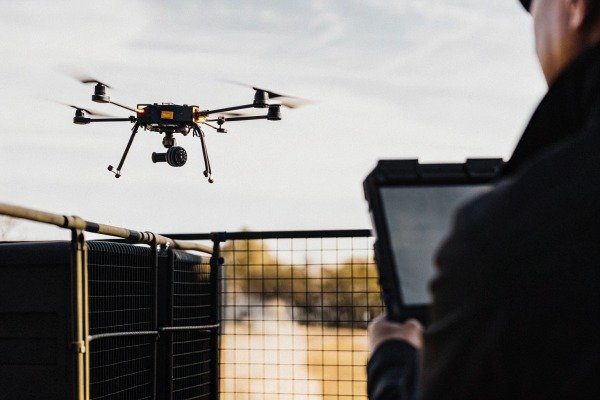 Close-up view of a modern quadcopter drone with high-resolution camera (ID#2)